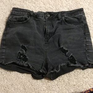 Ripped black shorts